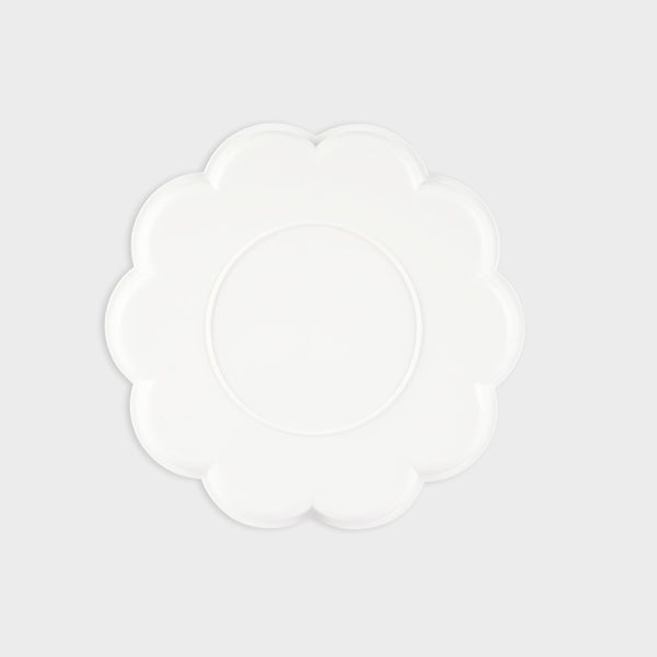 paleta de pintura hecha de plástico en forma de flor layers of