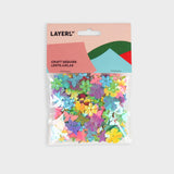 lentejuelas decorativas en formas de flores y mariposas