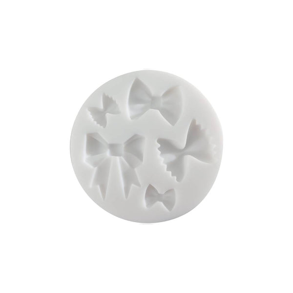 molde de silicona 7 cm en forma de lazos cernit