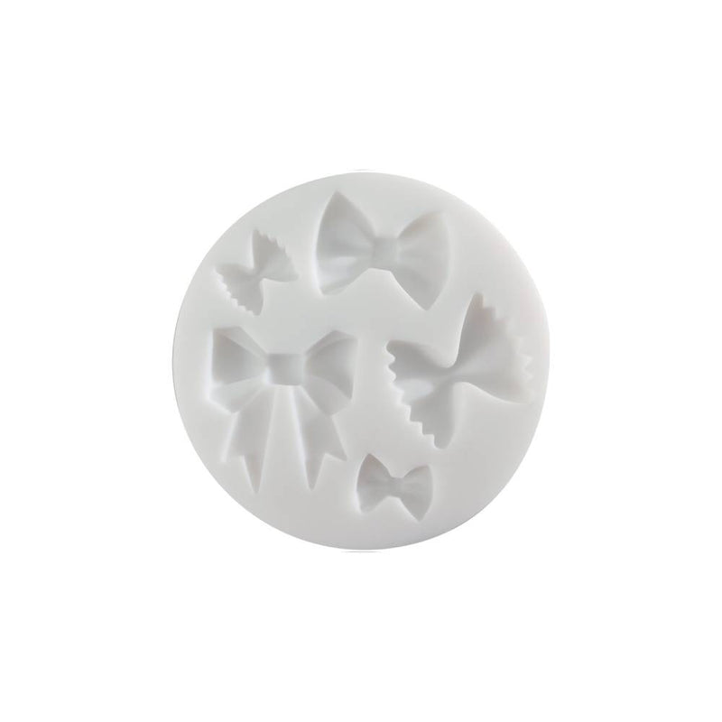 molde de silicona 7 cm en forma de lazos cernit